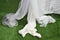 White fabric decoration curtain on green grass for wedding