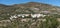 White facades town between mountains