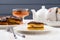 White faience teaware, homemade low callorie pumpkin dessert and