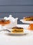 White faience teaware, low callorie pumpkin dessert and layered