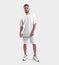 White fashion suit mockup, oversized t-shirt, shorts on a bearded guy in sneakers, front view, isolated on background