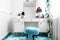 white, feminine dressing room with minimalist vanity table and mirror