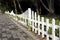 White fence of the garden in late autumn