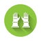 White Firefighter gloves icon isolated with long shadow. Protect gloves icon. Green circle button. Vector