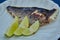 The white fish on plate with lime. Kosher food. Shallow dof.