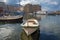 White fishing boat reflected in Camogli harbor