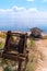 White fishing boat rest on shore. old rusty winch and boat on beach. beautiful summer landscape