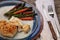 White flakey sea bass with breadcrumbs and roasted asparagus and