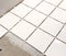 White Floor Tile Installation