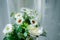 White flower bouquets with thin white curtains