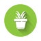 White Flower in pot icon isolated with long shadow. Plant growing in a pot. Potted plant sign. Green circle button