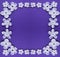 White flowers frame for Christmas or Valentine`s day. Crochet background frame, knitted white elements on the lilac