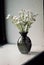 White Flowers In Grey Vase