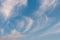 White fluffy clouds in the blue sky.