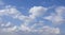 White fluffy clouds and blue sky