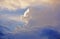 White fluffy clouds and blue sky