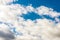 White fluffy clouds in the blue sky background.Cloudy white blue sky in the nice blue heaven sky