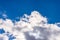 White fluffy clouds in the blue sky background.Cloudy white blue sky in the nice blue heaven sky