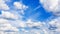 White fluffy clouds clear blue sky background panorama, cumulus cloud texture, cloudy azure skies backdrop, beautiful cloudscape