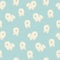 White fluffy cute cartoon happy flat dog on blue background seamless pattern