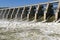 White foam created from water of dam spillways