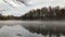 white fog flies over the river, cloudy autumn landscape, time lapse