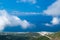 White fog high in the mountains on the Llogara pass. View from the highlands. Landscape of the Albanian Riviera