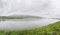 White fog over the  river in summer morning - panoramic view