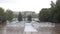 White folding chairs at the wedding ceremony with drops from the rain. Wet seat in the open air