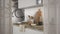 White folding door opening on modern luxury contemporary white kitchen, interior design, architect designer concept, blur