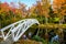 White footbridge among the colorful leaves in Somesville Maine