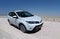 White four wheel drive vehicle parked on the edge of the Etosha Pan, Namibia