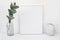 White frame mockup, eucalyptus branch in glass bottle, pitcher, styled minimalist clean image