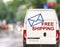 White free shipping Van driving fast on city blurr bokeh street