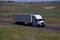 White Freightliner Semi-Truck / White Trailer