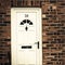 White front door of a red brick English town house. Manchester.