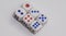 White game cubics with blue and red spikes dots on a white background. Game, gambling, chance and risk concept