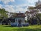 White gazebo surrounded by autumn colors in a Lumpini park, Bangkok, Thailand