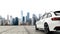 White generic and unbranded car parked in front a big city, 3D illustration