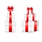 White gift box with red satin bow. The cubic shape of the real box, tied with red wrapping tape, stands on the surface in the