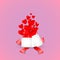 White gift box with red satin bow. A heart flies from an open gift. Tied with red wrapping tape, it stands on the surface in the