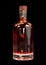 White Glass Whiskey, Scotch, Rum, Brandy, Cognac or Tequila Bottle Isolated on Black Background.