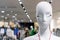 White glossy female mannequin with closed eyes