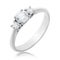 White gold engagement ring with three diamonds isolated. The photo was taken using the stacking method