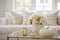 White and gold home autumn decoration. Flowers stand in a vase on the table next to the luxury sofa. Elegant home decor