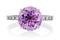 White gold ring with large amethyst and small cubic zirconias, isolated