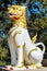 White, golden and red colored Chinthe Lion guardian