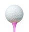 White Golf Ball on Pink Tee Isolated on a White Background