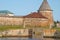 White Golovenkova tower and a Granary of the Solovetsky Kremlin and ancient sea dock. Russia