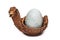 White goose Easter egg in basket for present